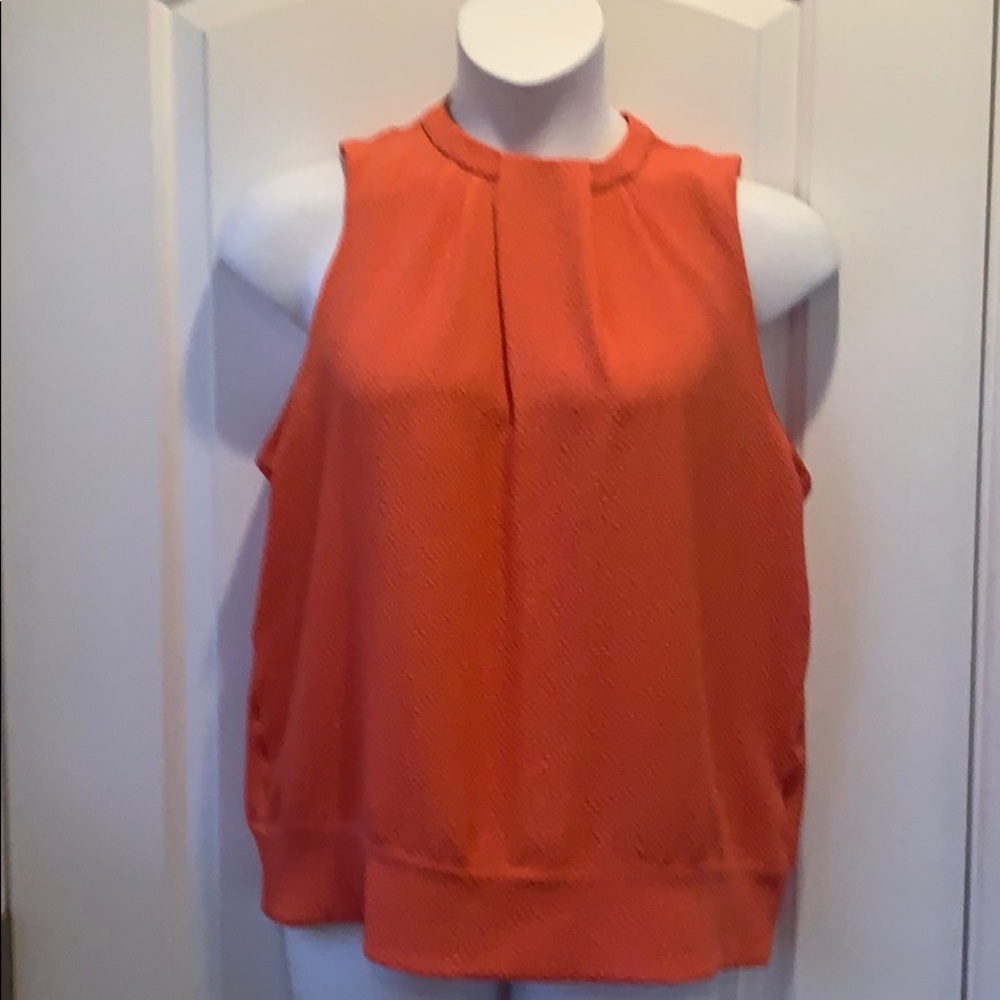 Orange sleeveless blouse